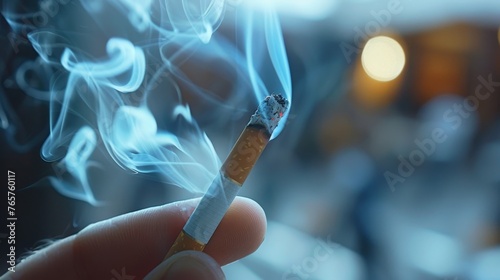 ): A close - up of a human hand holding a lit cigarette, with smoke swirling around, emphasizing the harmful effects of smoking 