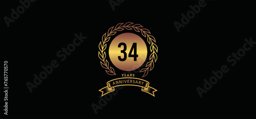 34st anniversary logo with gold, and black background photo