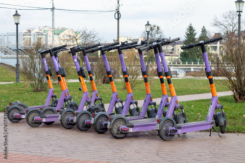 Scooters for rent are available in the parking lot