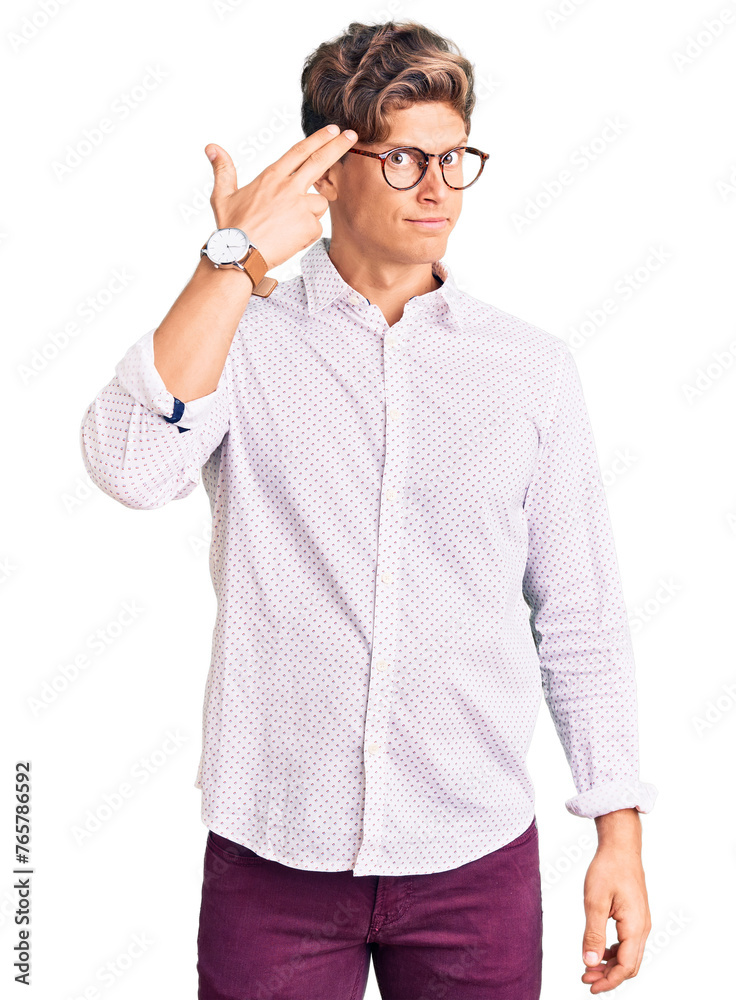 Young handsome man wearing business clothes and glasses shooting and killing oneself pointing hand and fingers to head like gun, suicide gesture. Young handsome man wearing business clothes and glasses shooting and killing oneself pointing hand and fingers to head like gun, suicide gesture.