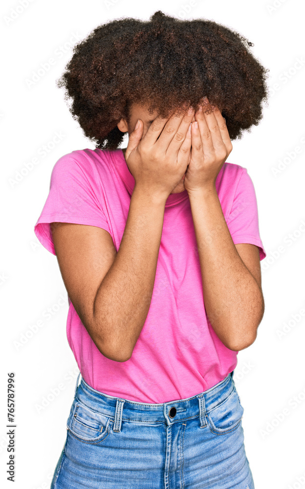 Young hispanic girl wearing casual clothes with sad expression covering face with hands while crying. depression concept. Young hispanic girl wearing casual clothes with sad expression covering face with hands while crying. depression concept.