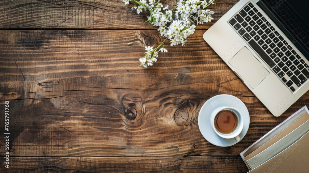 It's time for a break, a cup of coffee and a laptop on the wooden table. The spring concept. It's time for a break, a cup of coffee and a laptop on the wooden table. The spring concept.