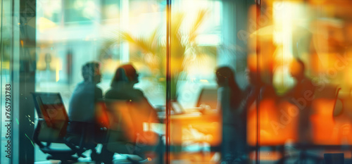abstract view of business people in a meeting through glass with reflections