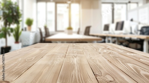 Wooden table top with blurred office