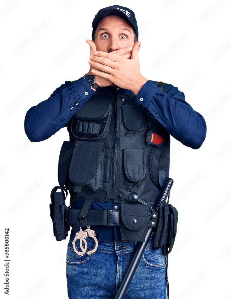 Young handsome man wearing police uniform shocked covering mouth with hands for mistake. secret concept. Young handsome man wearing police uniform shocked covering mouth with hands for mistake. secret concept.