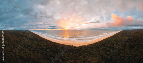 High angle aerial drone view of famous Seventy Five Mile Beach, 75 mile beach on Fraser Island, Kgari, Queensland, Australia, shortly before sunset photo