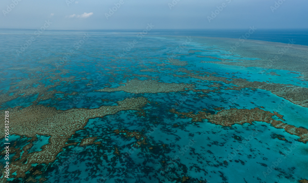Aerial view of Great Barrier Reef coral reef structure in Whitsundays, Aerilie beach, Queensland, Australia Aerial view of Great Barrier Reef coral reef structure in Whitsundays, Aerilie beach, Queensland, Australia