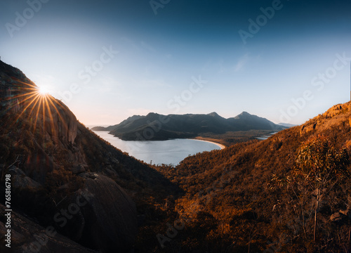 Sunrise Sunset Aerial view of Wineglass Bay beach and mount amos. Freycinet Park, Tasmania, Australia photo