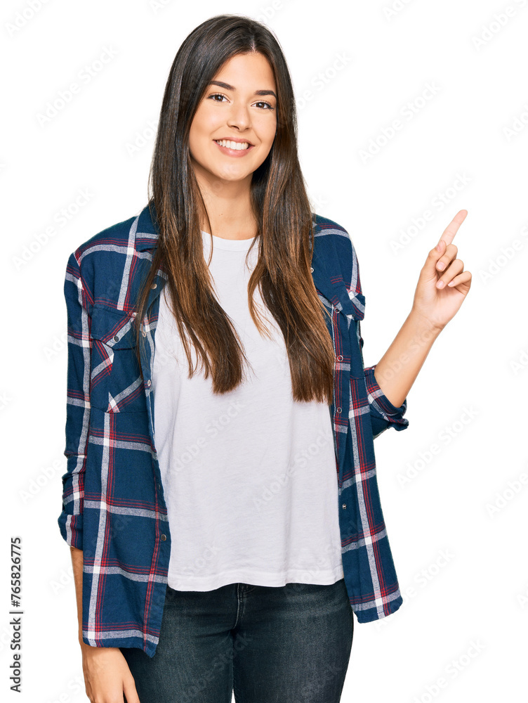 Young brunette woman wearing casual clothes smiling happy pointing with hand and finger to the side Young brunette woman wearing casual clothes smiling happy pointing with hand and finger to the side