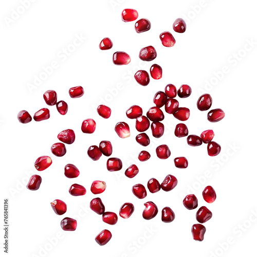 Falling pomegranate seeds isolated on transparent background. Top view.