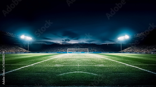 A soccer field with a bright blue sky in the background. The field is lit up with bright lights  creating a sense of excitement and anticipation for the game