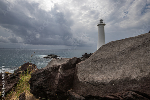 Le Phare du Vieux-Fort, white lighthouse on a cliff. Dramatic clouds overlooking the sea. Pure Caribbean on Guadeloupe, French Antilles, France © Jan