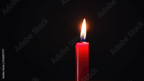 One red candle burns on a dark background. Memory  memorial  romance  prayer  religion. Copyspace  free space  place for text.