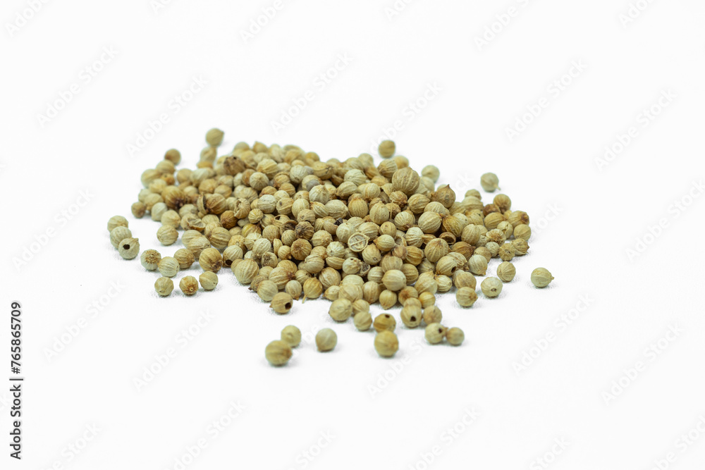Close up of Dried Coriander seeds isolated on white background Close up of Dried Coriander seeds isolated on white background
