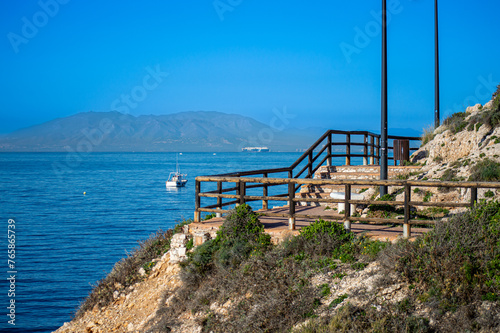 Morning walking on paths above rocks and through 