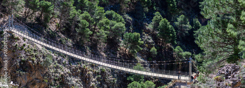 Hiking trail to Colgante bridge (Puente Colgante El Saltillo) over Almanchares river, Sierra Tejeda, Andalusia, Spain photo