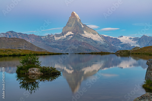 The Matterhorn reflected in Stellisee lake in the Swiss Alps