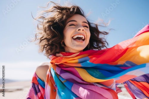  A playful shot of a person rocking a colorful scarf made from upcycled silk, illustrating the vibrancy and versatility of sustainable fashion accessories.