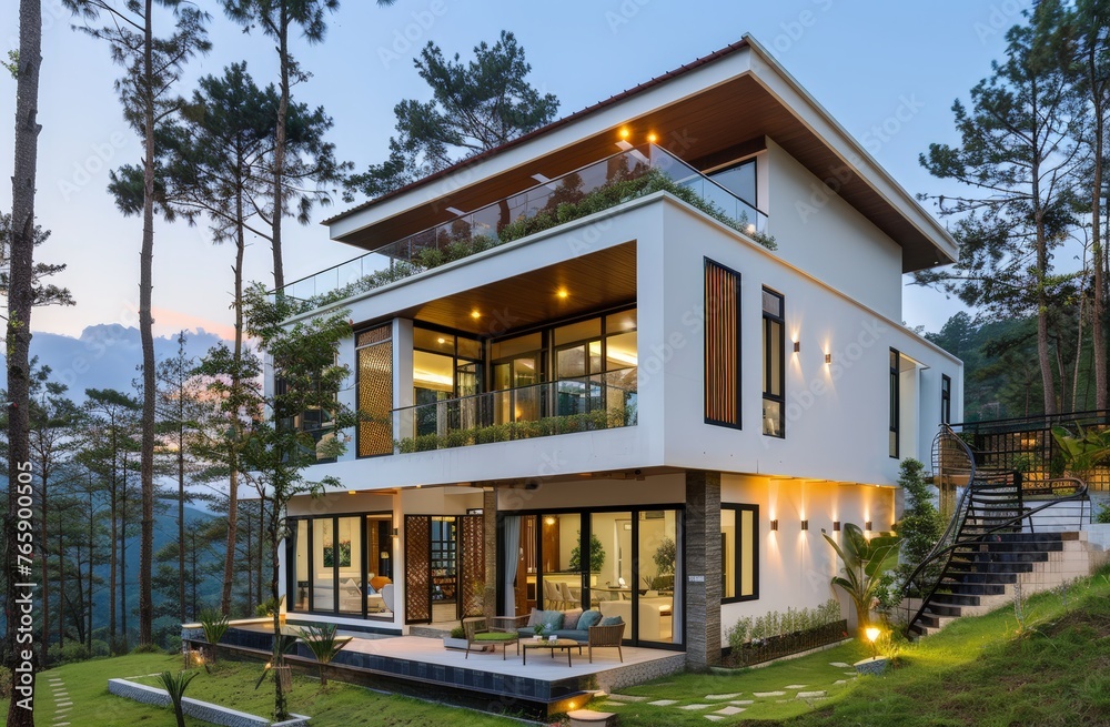 Fototapeta premium A grand white residence with numerous windows standing tall against the sky