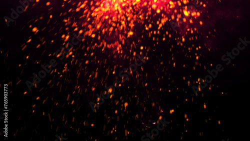 Dark Glitter Fire Lights Rise Through Smoke, Fog, and Misty Texture Over Black Background, Burning Sparks in this Abstract Composition, Red Glowing Ember Particles.