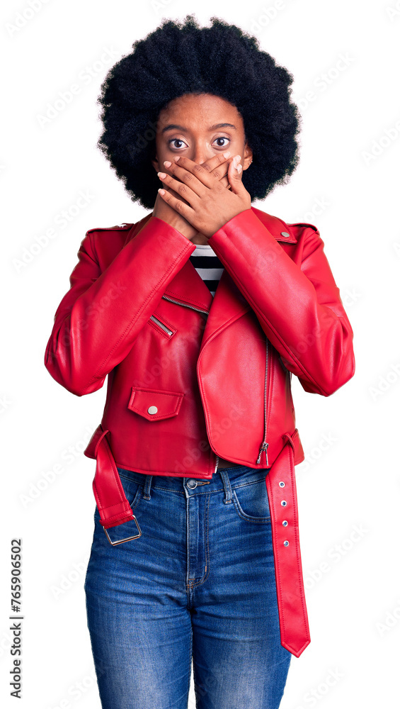 Φωτογραφία Young african american woman wearing red leather jacket shocked covering mouth with hands for mistake