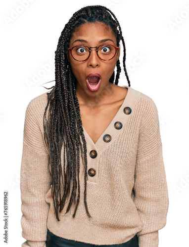 African american woman wearing casual clothes afraid and shocked with surprise and amazed expression, fear and excited face.