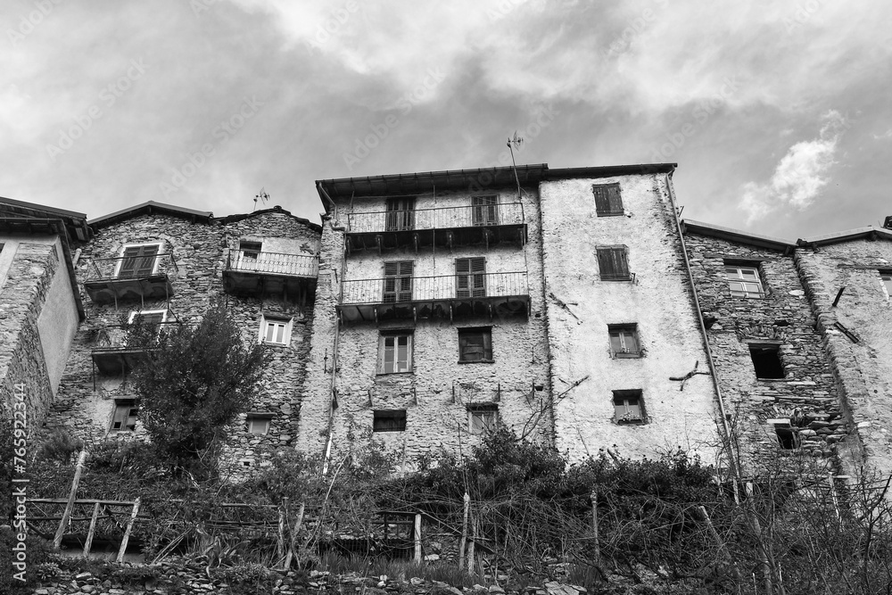 Obraz premium Black and white photo. Low-angle view of medieval houses in the so-called