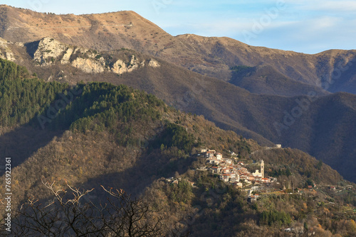 Elevated view of the Argentina Valley in the Ligurian hinterland with the ancient village of Andagna, in the municipality of Molini di Triora, in winter, Imperia, Liguria, Italy photo