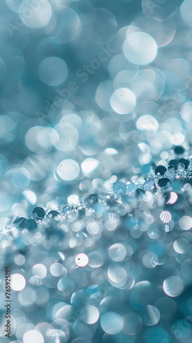 Abstract background of glitter vintage lights. De-focused banner blurred light element for cover decoration bokeh. Holiday concept with light blue and grey particles Christmas silver shine particles