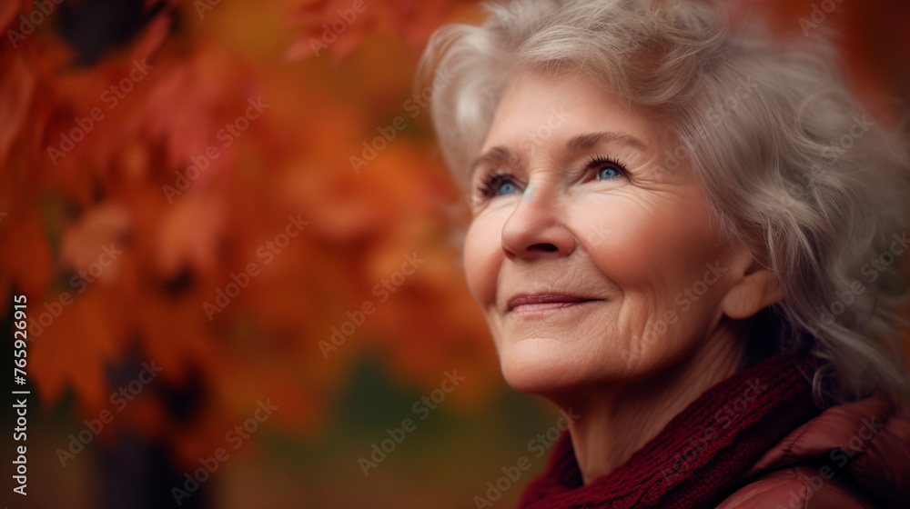 A woman with a red scarf and a blue shirt is smiling A woman with a red scarf and a blue shirt is smiling