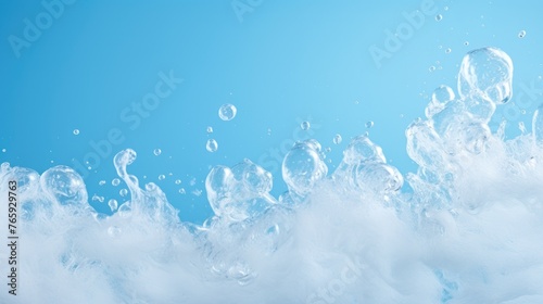 Lush white foam on a blue background, the structure of soap bubbles. Abstract background. © Cherkasova Alie
