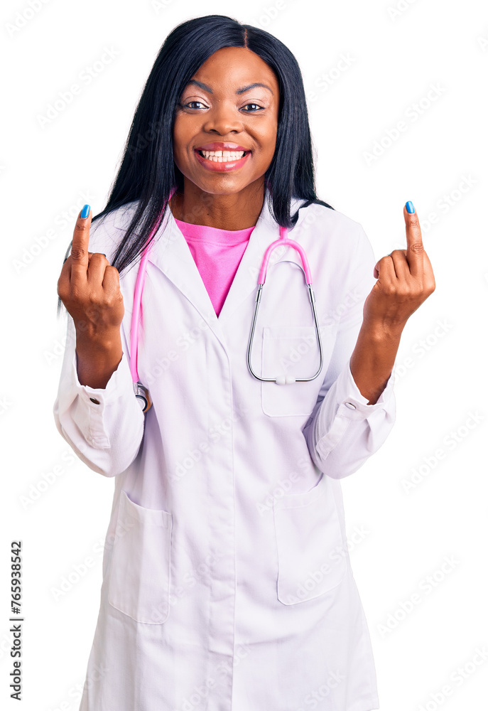Young african american woman wearing doctor stethoscope showing middle finger doing fuck you bad expression, provocation and rude attitude. screaming excited Young african american woman wearing doctor stethoscope showing middle finger doing fuck you bad expression, provocation and rude attitude. screaming excited