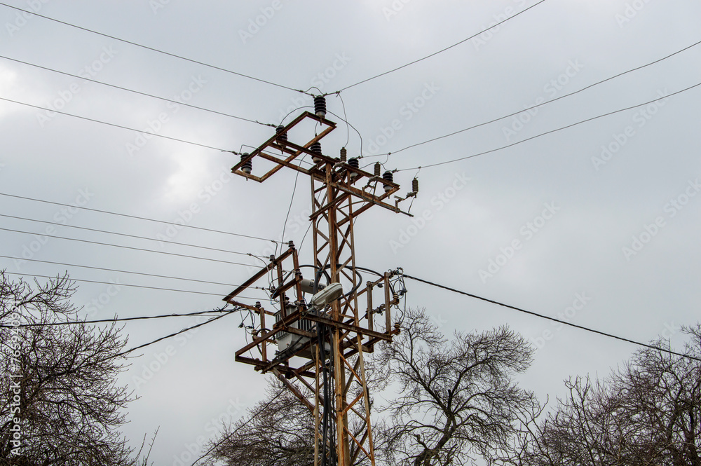 Electric transmission pole in rainy weather