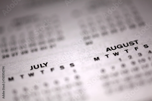 Calendar page - shallow depth of field - focus on July August month photo