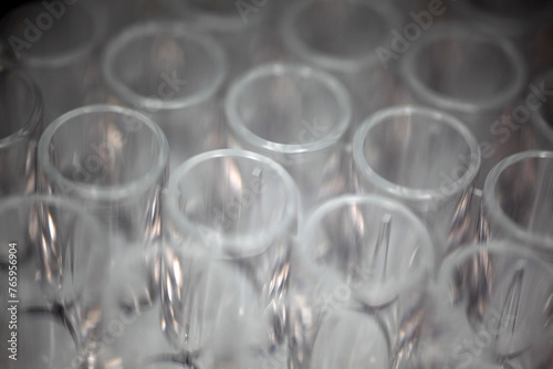 Close-up of a transparent plastic 96-well plate used for luminescence measurement in biology - shallow depth of field