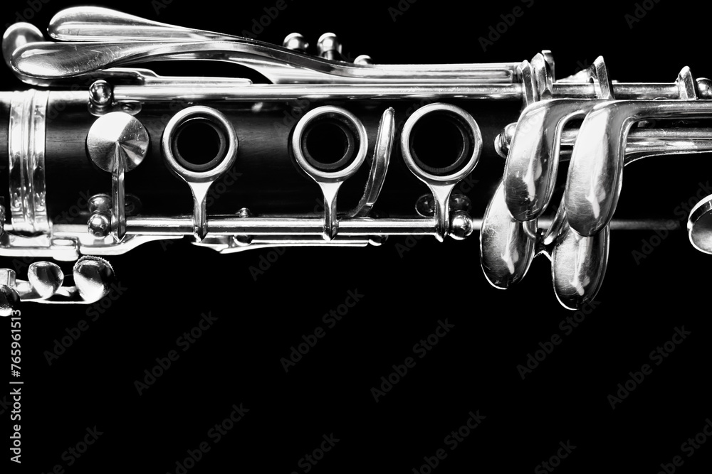 Fototapeta premium Clarinet woodwind instrument close up on black background
