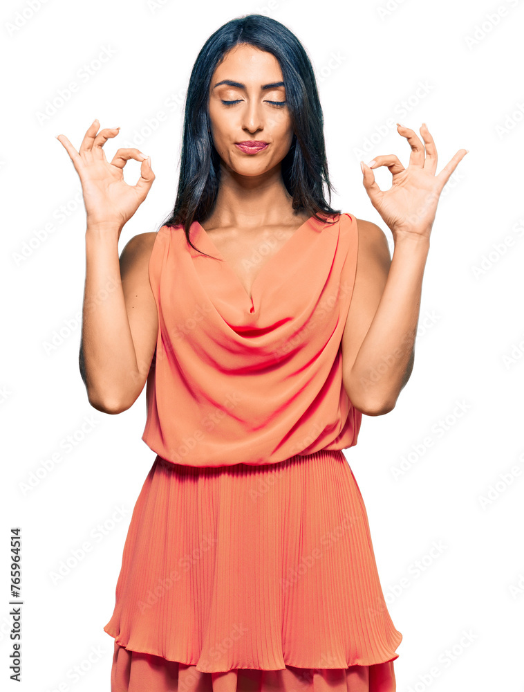 Beautiful hispanic woman wearing summer dress relax and smiling with eyes closed doing meditation gesture with fingers. yoga concept. Beautiful hispanic woman wearing summer dress relax and smiling with eyes closed doing meditation gesture with fingers. yoga concept.