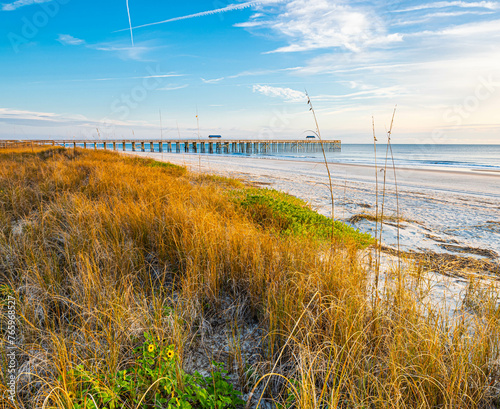 Sand Dunes and Wooden Pier on Fernandina Beach, Amelia Island, Florida, USA