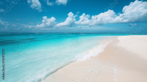 A serene beach scene, with white sand and turquoise waters stretching out to the horizon © Vika