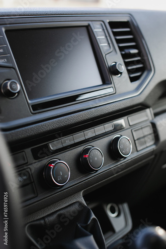 Car dashboard with multimedia display and climate control © kucheruk