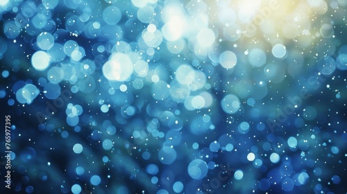 An abstract background with a bokeh effect in varying shades of blue, creating a dreamy underwater-like atmosphere.