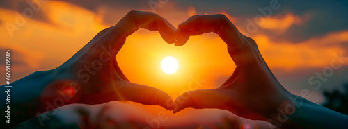 Heart-Shaped Hands at Sunset
