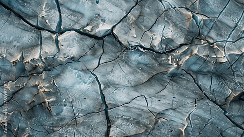 The top view offers a close-up of the textured, dry surface of the massive Vatnajökull glacier in Iceland on a winter day