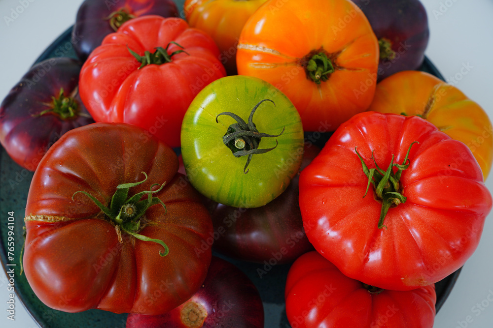 Bowl of colorful heirloom tomatoes in Provence, France Bowl of colorful heirloom tomatoes in Provence, France