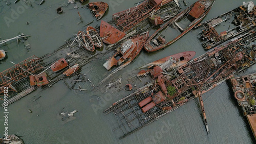 Remains of ship vessels disintegrating in harbor