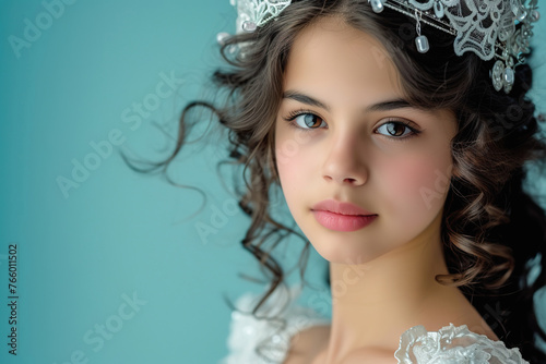 Hispanic 15 years old Beauty Queen in crown, studio portrait