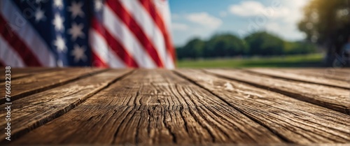 Wooden table top with copy space, blur background for Memorial or Veterans Day, 4 July, independence day, labor day