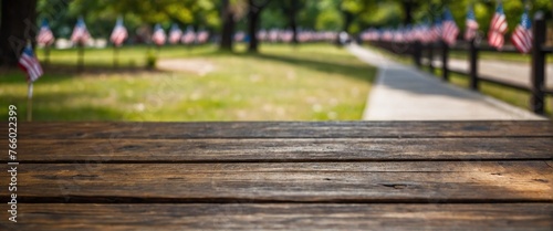 Wooden table top with copy space  blur background for Memorial or Veterans Day  4 July  independence day  labor day