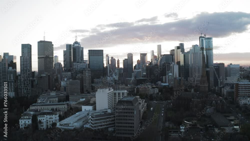 Aerial Panning Scenic View Of St Patrick'S Cathedral In Front Of Modern Office Towers In City Under Clouds - Melbourne, Australia Aerial Panning Scenic View Of St Patrick'S Cathedral In Front Of Modern Office Towers In City Under Clouds - Melbourne, Australia