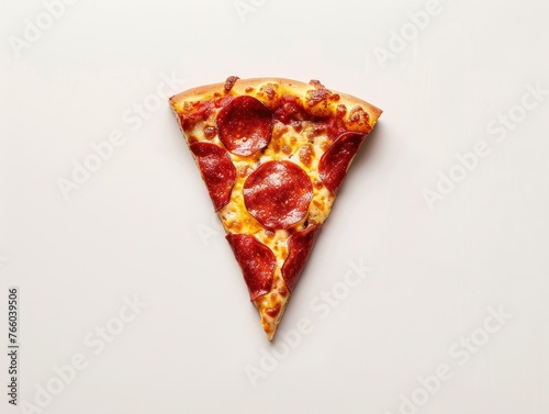 A minimalist composition featuring a single slice of pepperoni pizza against a stark white background
